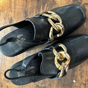 Seychelles Black Mules with Gold Chain Accent